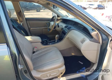 2004 Toyota Avalon Xl z USA, uszkodzony, nr VIN 4T1BF28B64U367925